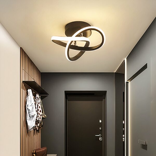 Schwarze LED-Badezimmer-Hängeleuchte minimalistisch und modern an einer Decke auf grauem Hintergrund