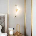 Origami-Wandleuchte in Form eines Vogels — im Raum