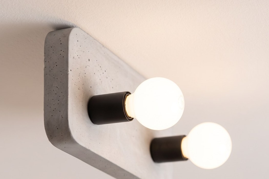 Industrieller Deckenstrahler aus Beton und Metall